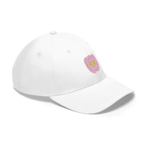 a white hat with a pink face on it