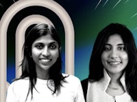two women standing next to each other in front of a green and blue background