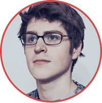 a young man with glasses and a plaid shirt