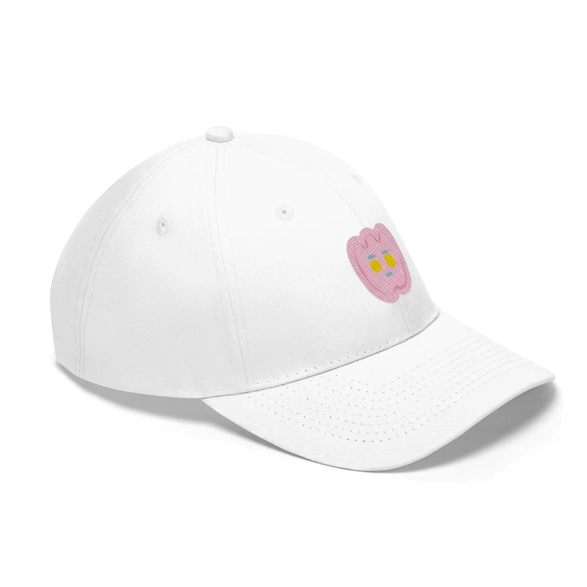 a white hat with a pink face on it